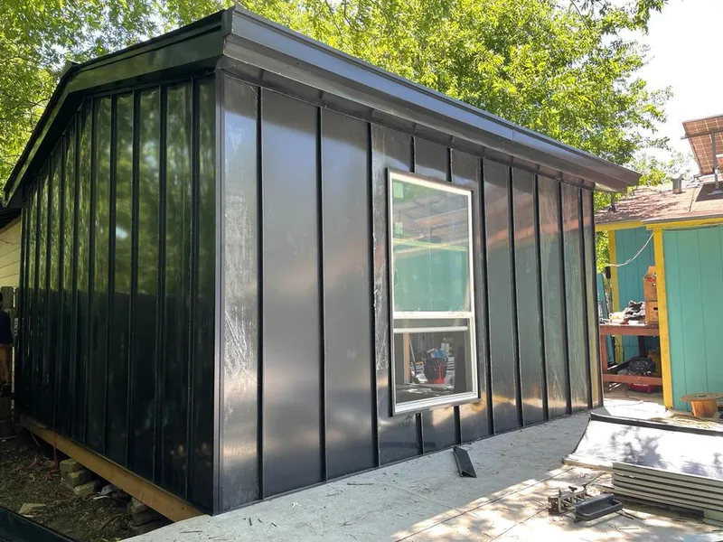 Black standing seam metal wall panels for Roof Inspection in Marysville